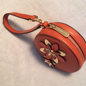 Orange Michael Kors change purse